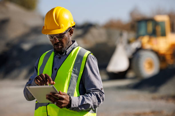 A vetted Harare contractor reviewing project details on site